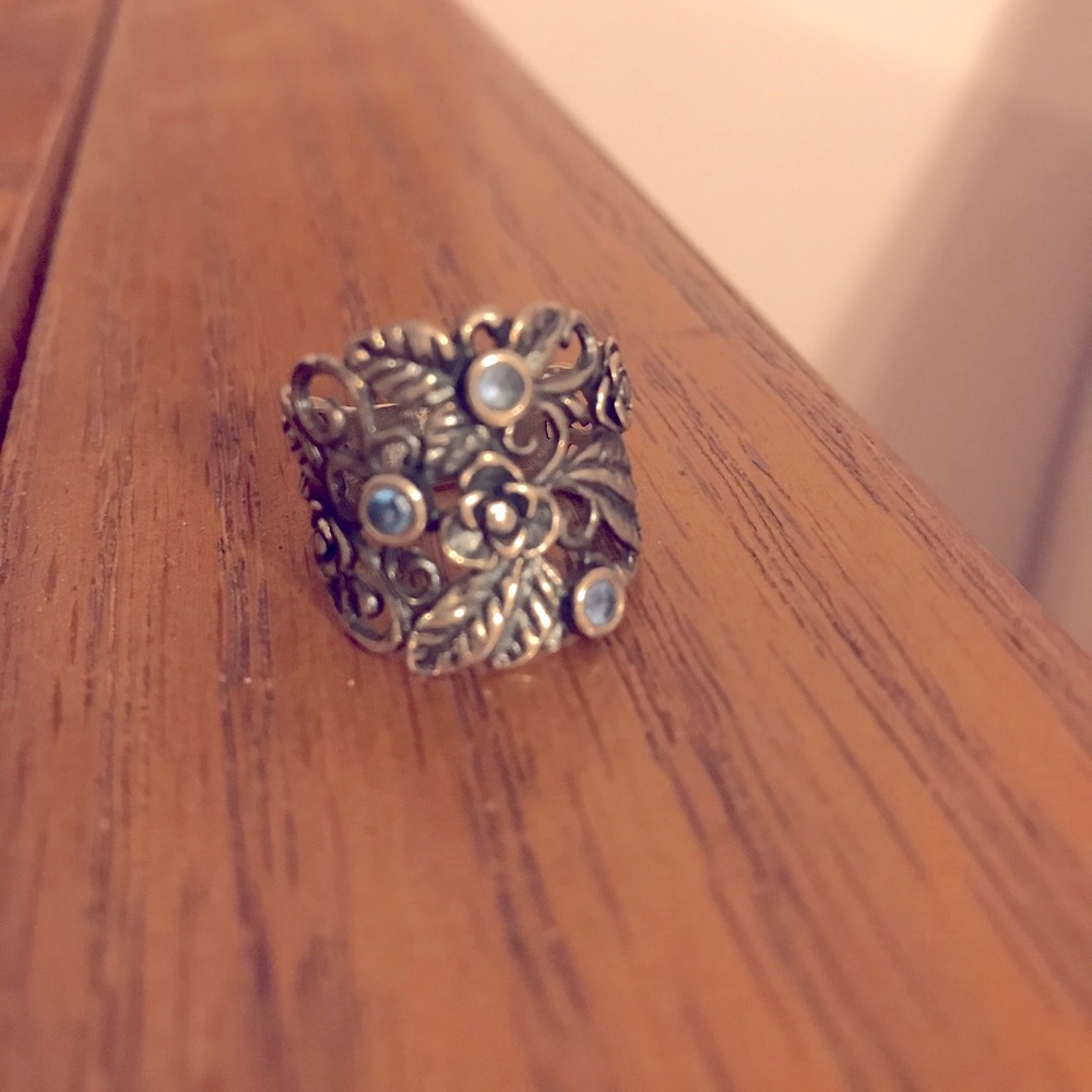 Thick sterling silver ring with blue gems